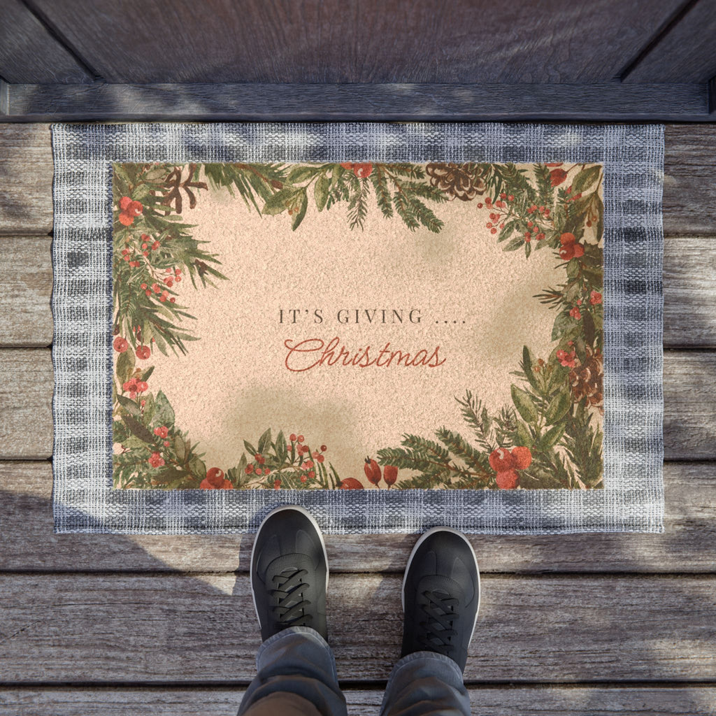 Bring the holiday vibes straight to your doorstep with a mat that’s equal parts classy and playful